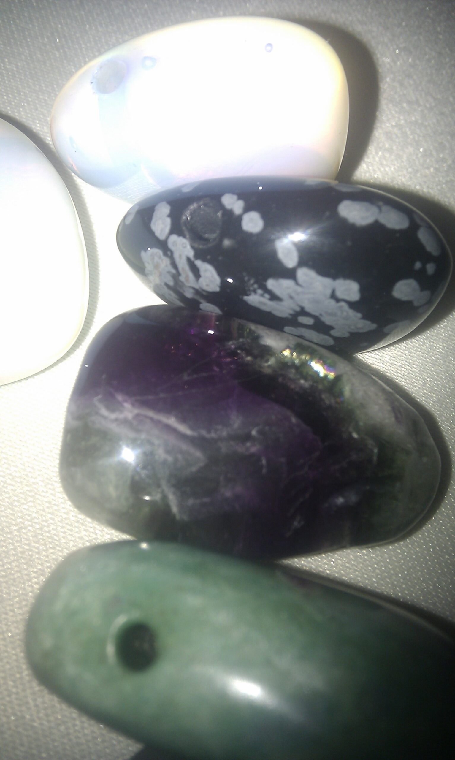 pendant made of semi-precious stones drilled